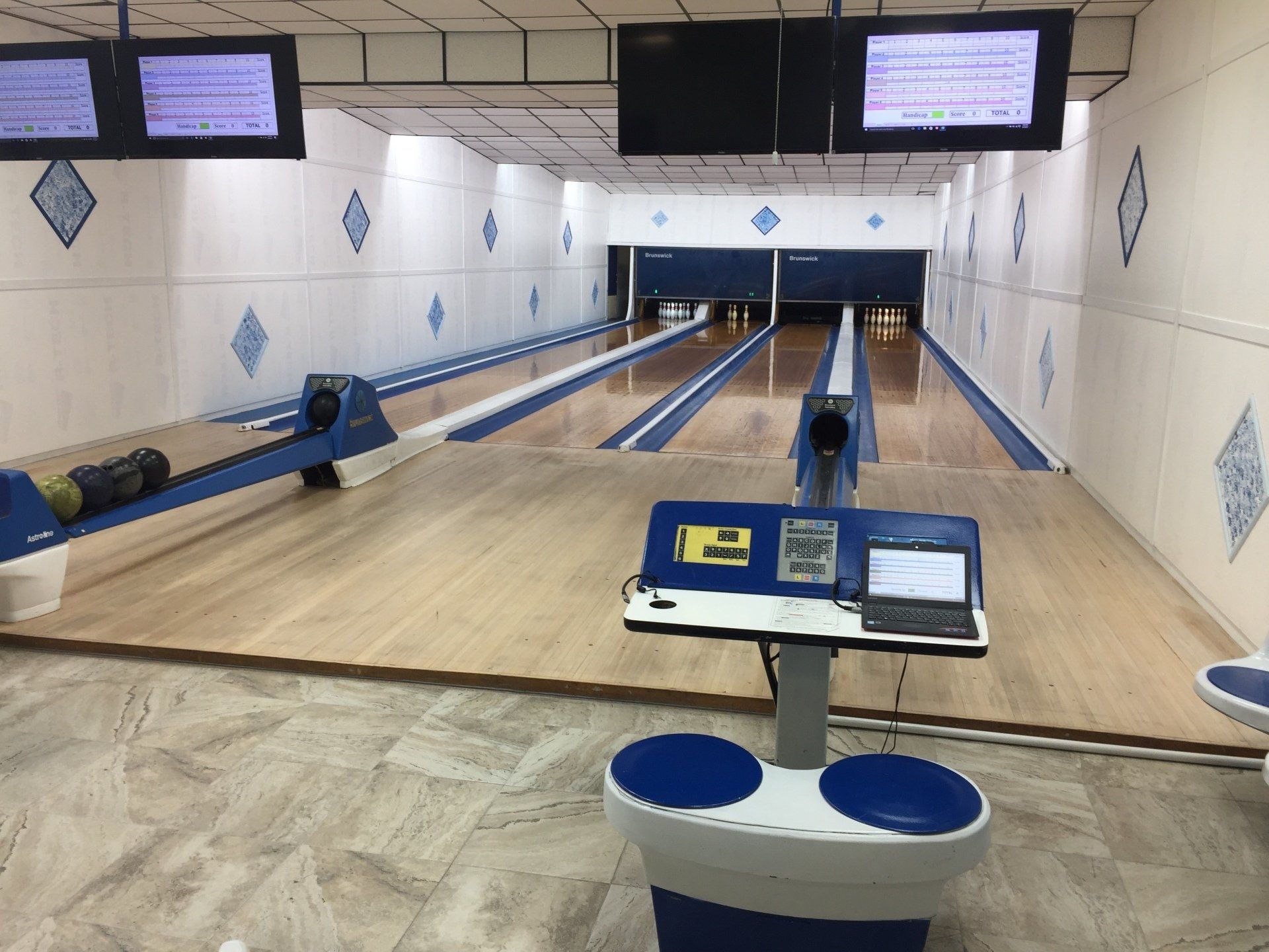 The four-lane community bowling alley